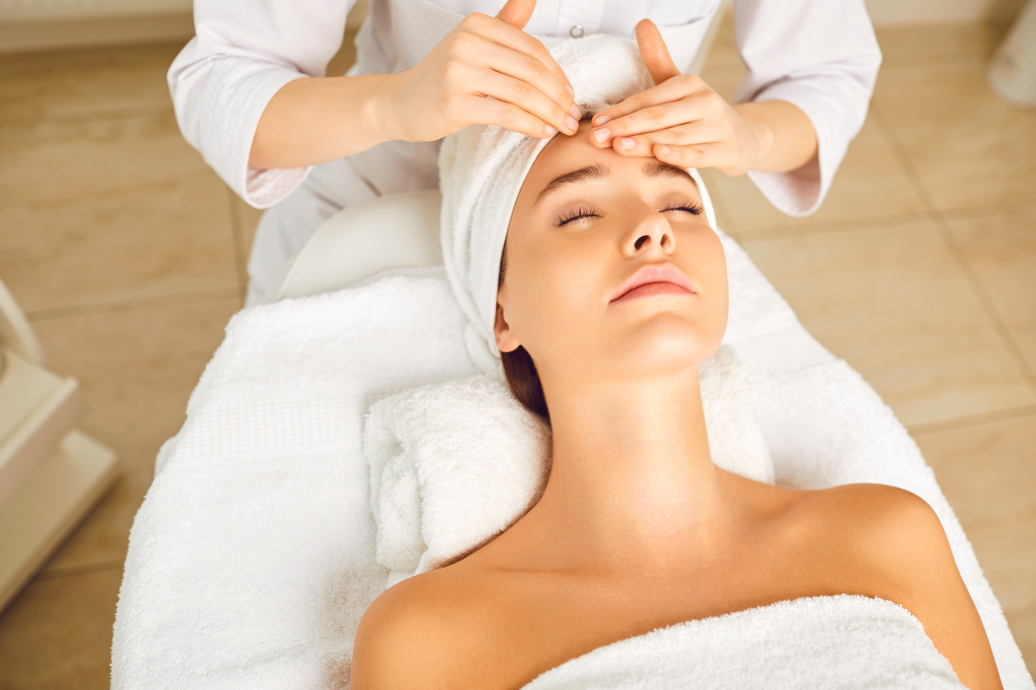 Facial Massage to a Beautiful Girl in a Beauty Clinic.