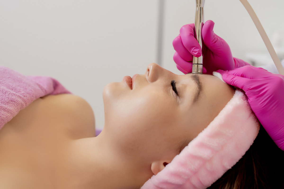 Diamond microdermabrasion, peeling cosmetic. woman during a